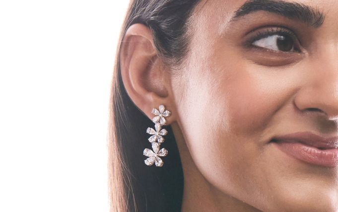 Woman wearing diamond pendant necklace