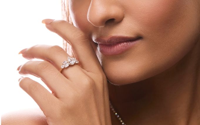 Woman wearing gold and diamond rings